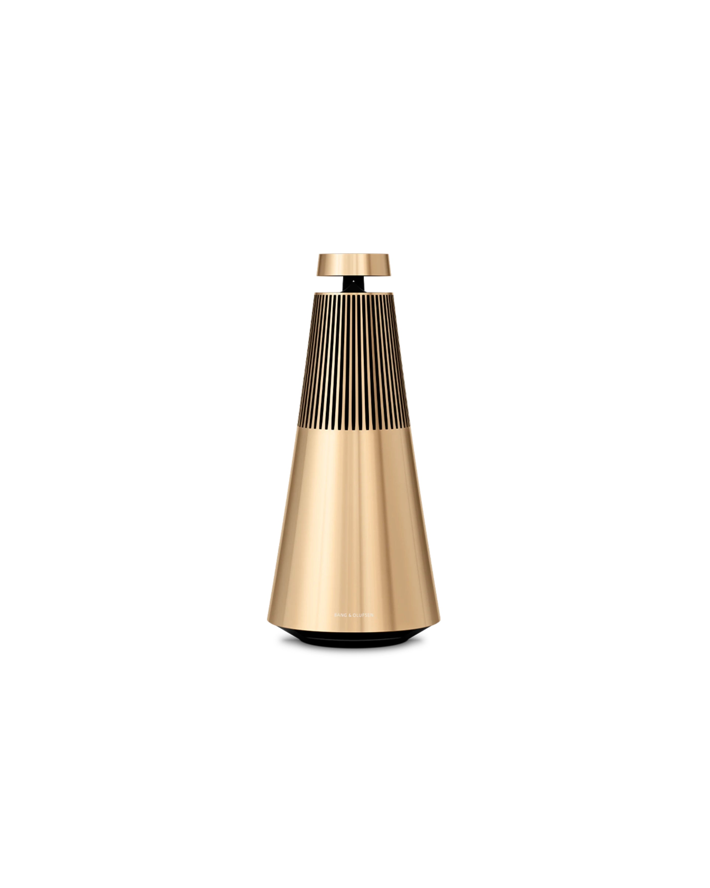 Gold and black cylindrical speaker on a white background