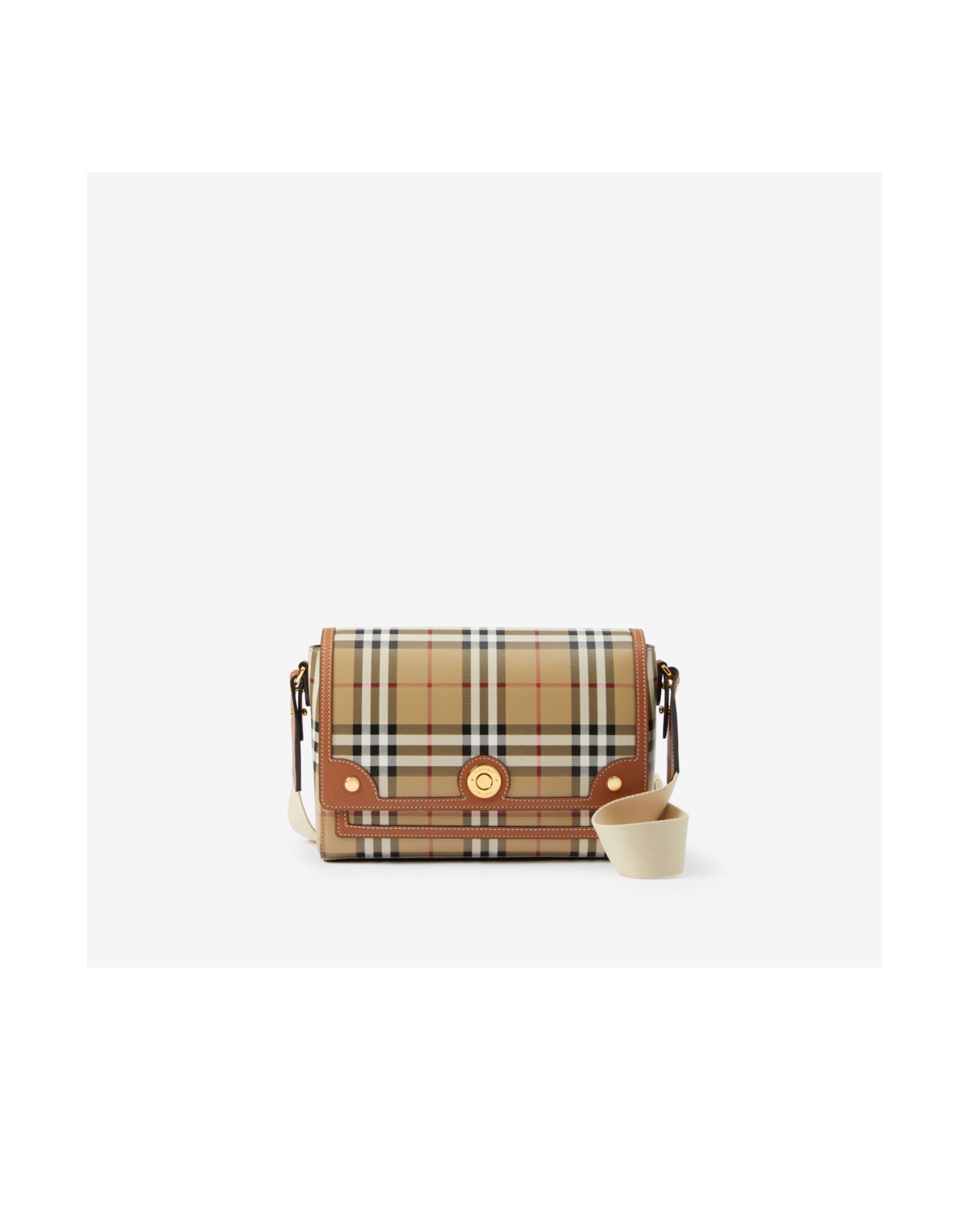 Burberry Plaid patterned handbag on a white background