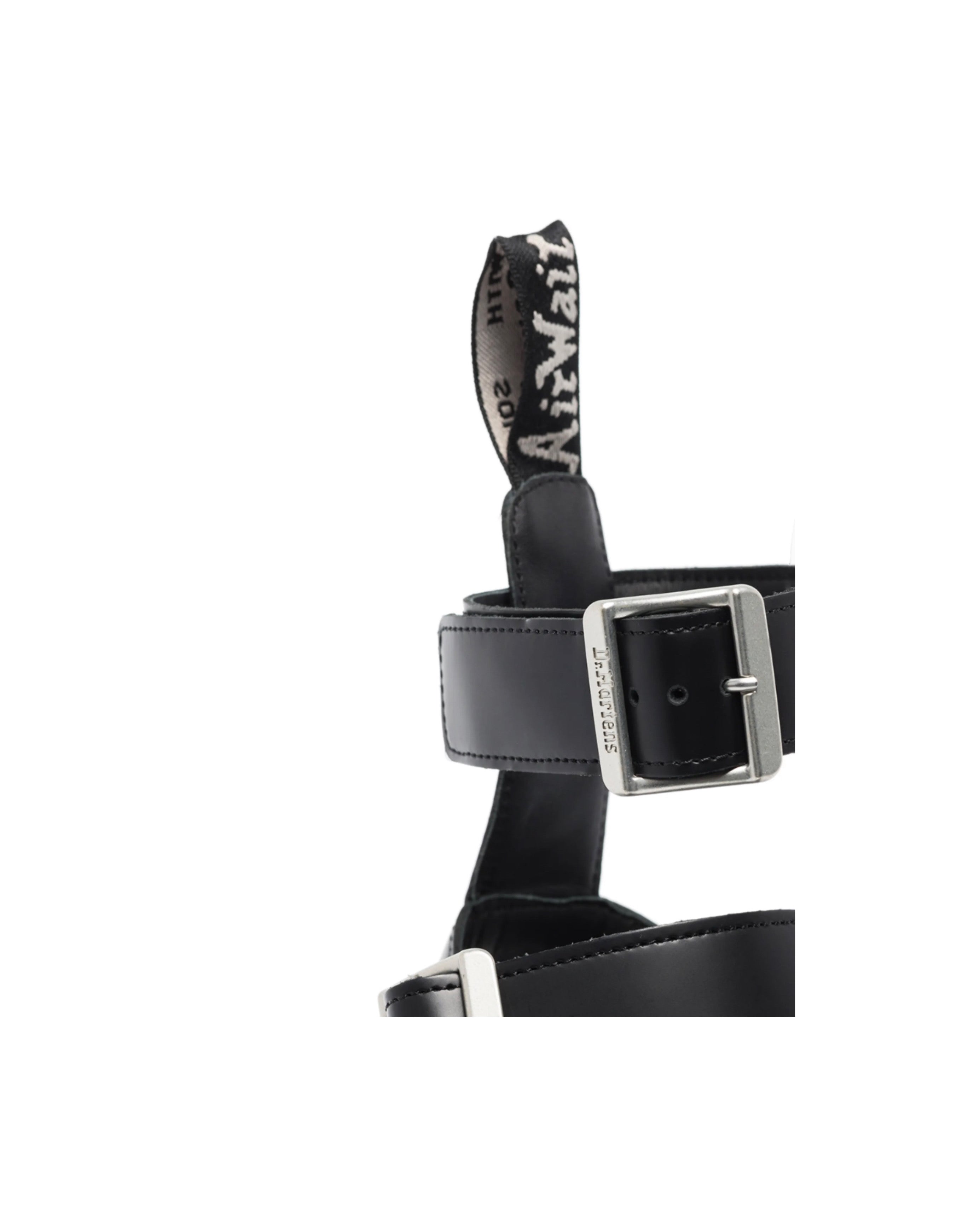 Black belt with silver buckle on a white background