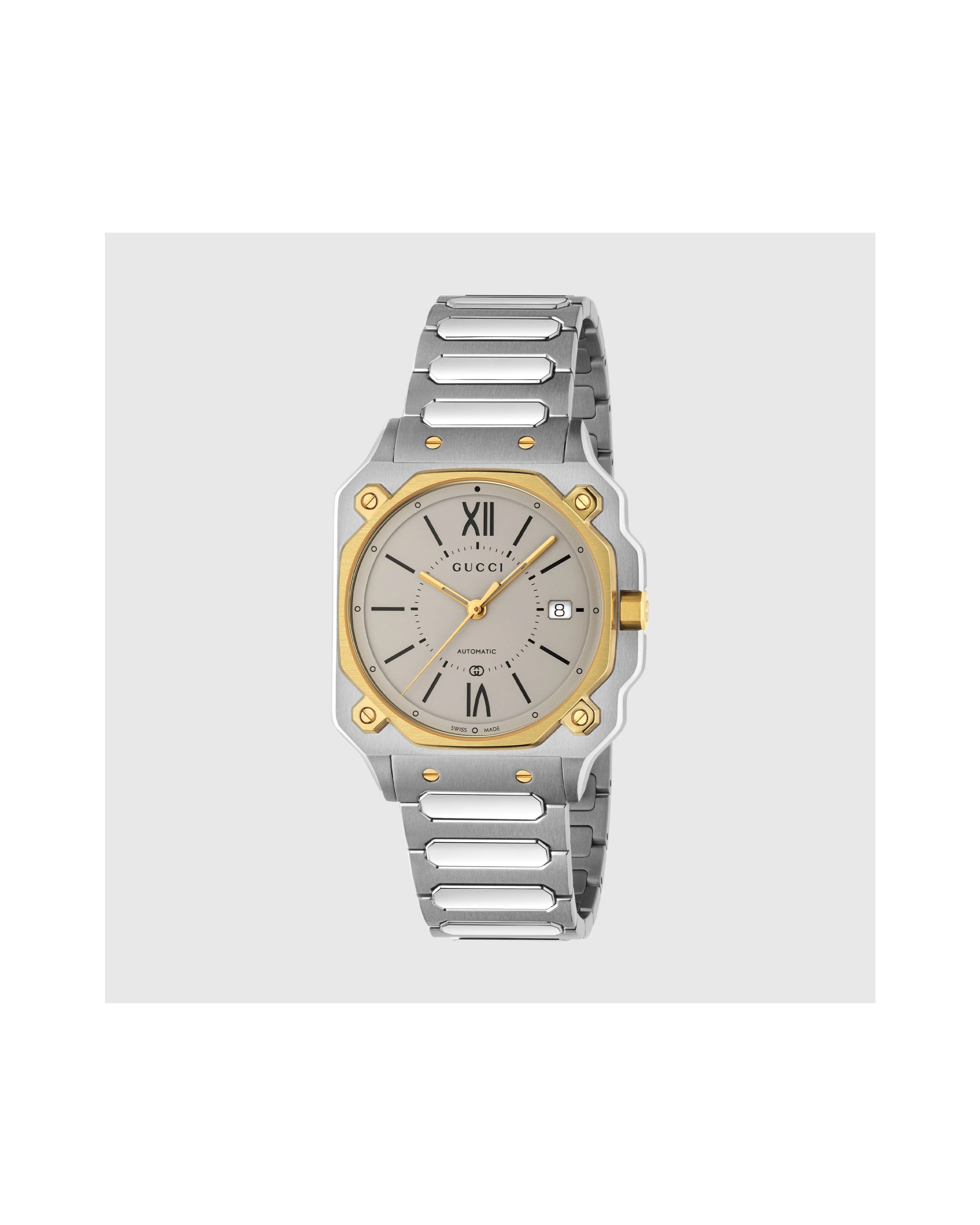 Gucci watch with silver and gold band on a white background