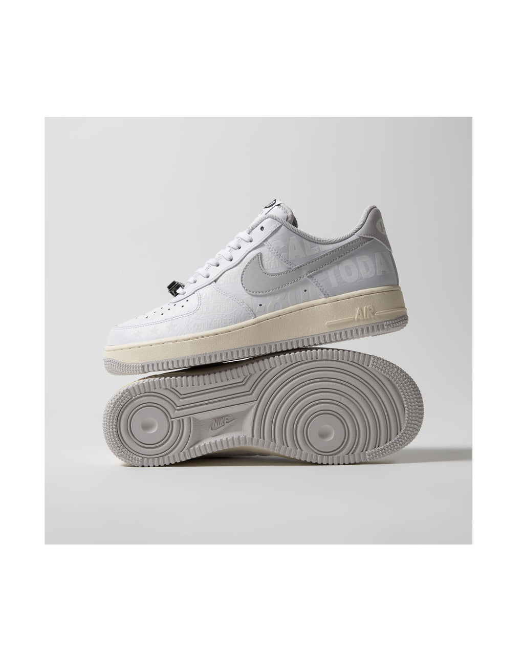 Gray and white sneakers on a white background